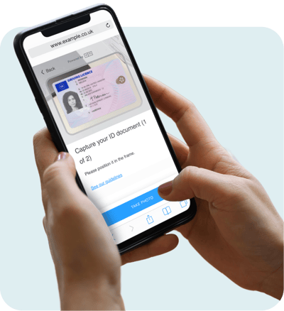 Phone screen showing UK driving license being scanned Phone screen showing UK driving license being scanned
